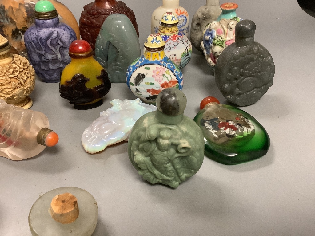 Twenty five Chinese snuff bottles, various materials